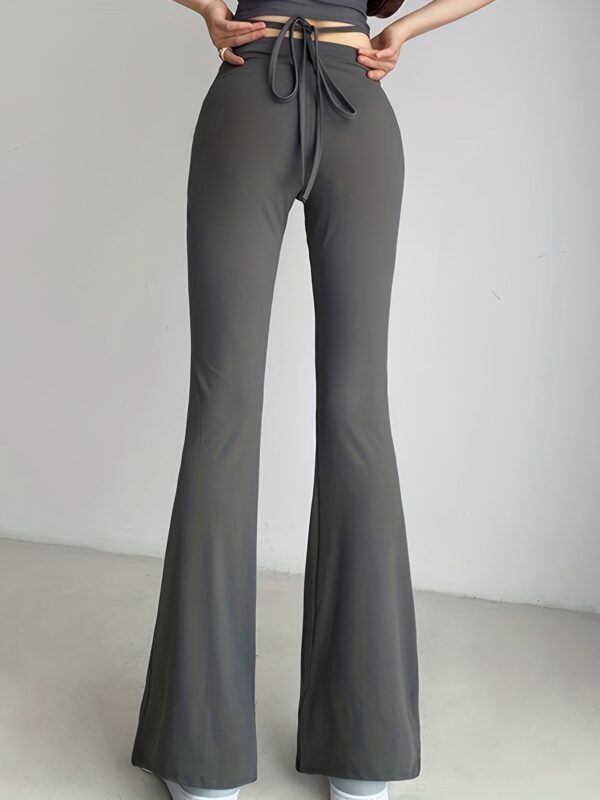 Solid Black High Waist Flare Leggings with Open Navel Criss Cross Straps - Image 5